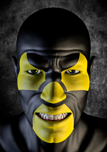 3D render of scary male face with nuclear energy symbol painted on