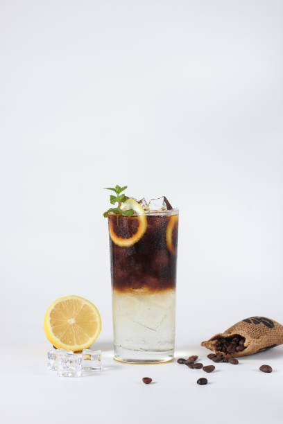 istock Ice black coffee with lemonade and soda on white background 1477800660
