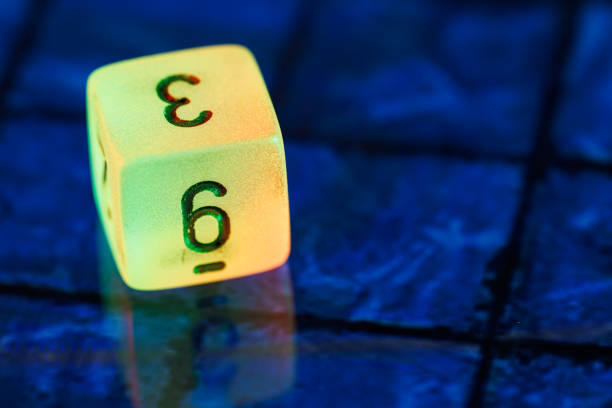White dice on top of a jigsaw puzzle