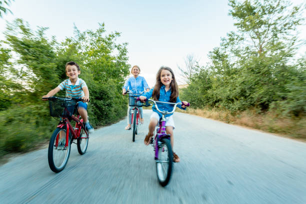 istock Family riding bicycle together 1477805925