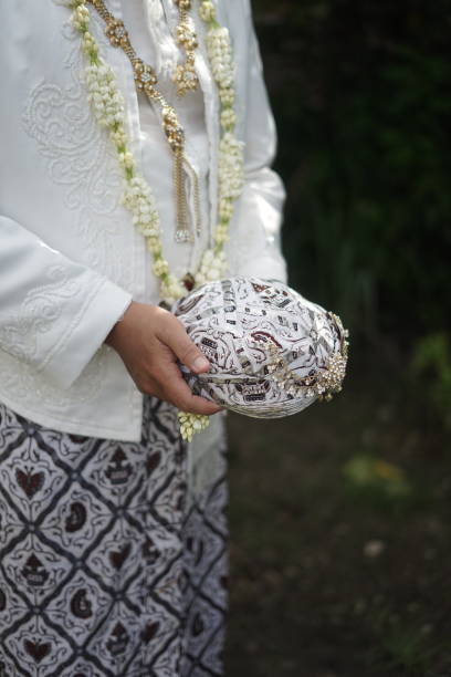 istock Blangkon and kebaya wedding dress 1477807551