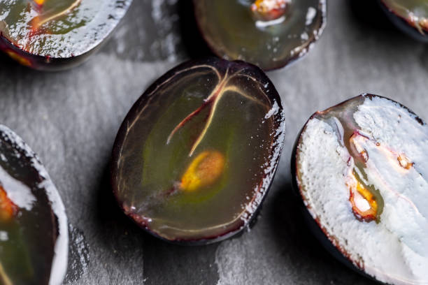 istock sweet ripe black grapes cut in half 1477810283