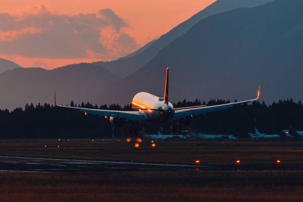 istock Commercial passenger aircraft taking off at sunset 1477810666