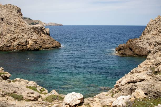 istock rocky cliffs by the ocean as seen from above in a cove 1477812041