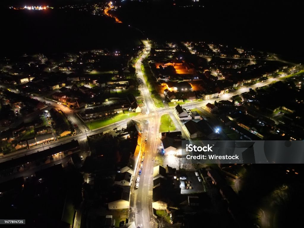 Aerial View Of A Cityscape At Night With Streets Illuminated With ...