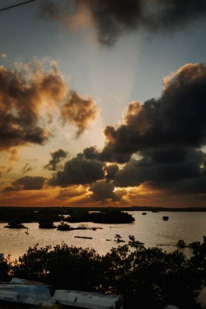 istock Stunning sunset over a peaceful visible on the horizon in Progreso, Yucatan, Mexico 1477815214