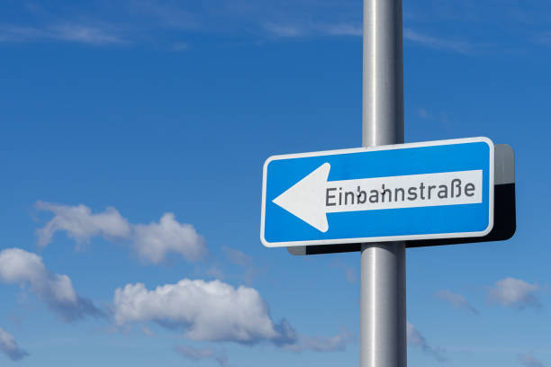 istock Low Angle View Of Road Sign Against Clear Cloudy Sky 1477816786