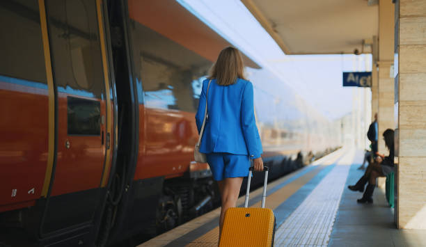 istock Woman walks along the platform at the train station. 1477821118