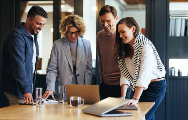 istock Successful business team connecting with their clients on a video call 1477822155
