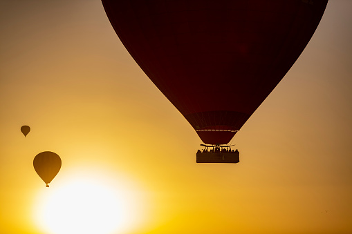 Hot air balloon flying over spectacular Cappadocia