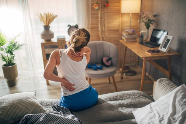 istock woman in bed having backache 1477838429