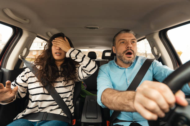 istock Scared Couple Riding Automobile Having Risk Of Car Accident 1477841691
