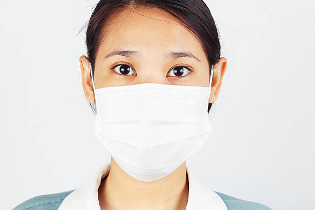 istock woman wear face mask 147784212