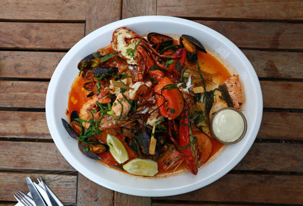 istock Grilled seafood platter on wooden table 1477842628
