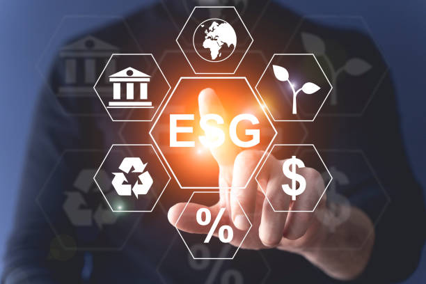 istock Global ESG technology concept. Man's hand presses a holographic button. Environmental, Social, and Corporate Governance idea. 1477843966