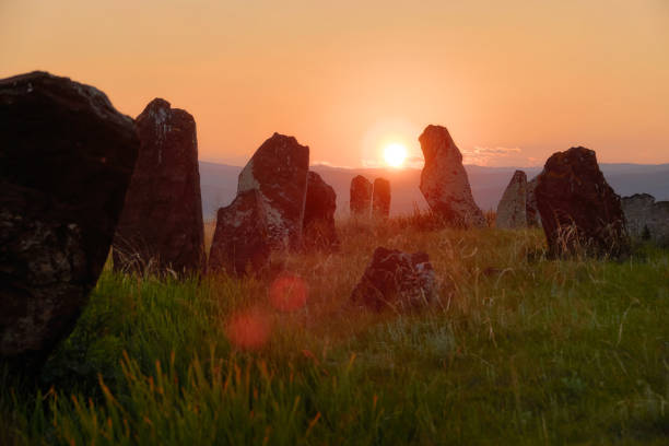 View of the ancient burial mounds and menhirs in the steppes and mountains of Khakassia, Russia.