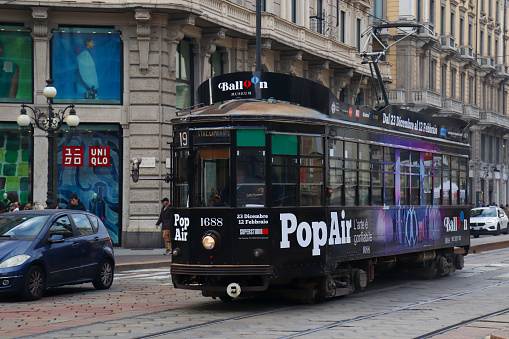 Lisbon, Portugal - May 31, 2022: In the streets of Lisbon by day. Historic tram in everyday life.
