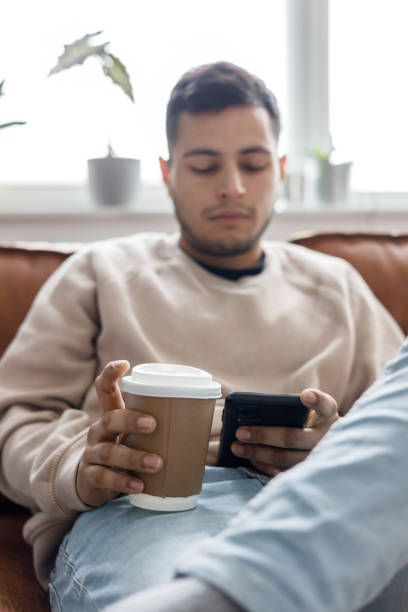istock Young Latino man at home 1477853176
