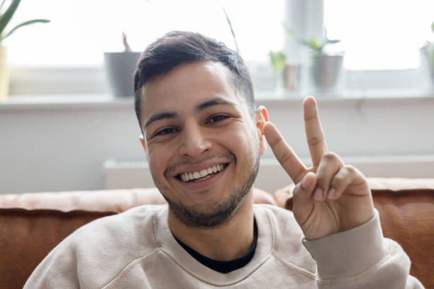 istock Young Latino man at home 1477853203