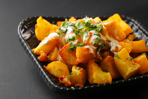 Aloo chaat is a popular Indian street food that is enjoyed by many.