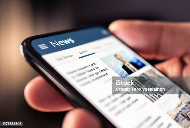 News Online In Phone Reading Newspaper From Website Digital Publication And Magazine Mockup Press Feed With Latest Headlines In Digital Web Portal Stock Photo - Download Image Now
