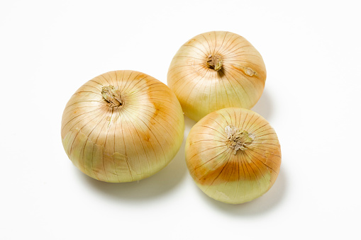 onions, garlic, hot pepper and spices isolated on white background. Top view.