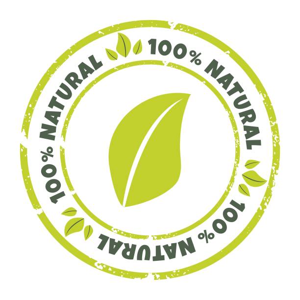 istock 100 percent natural label. Vector natural product sticker, badge. Textured round logo with green leaves for organic and eco friendly products 1477860198