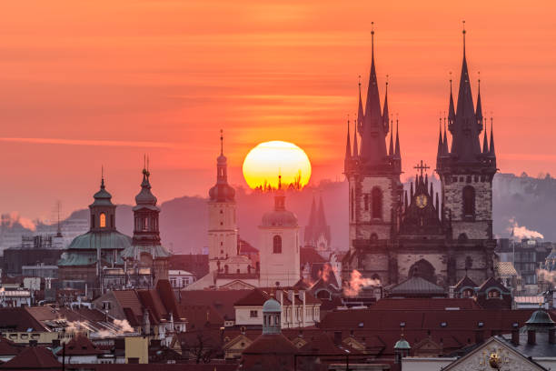 istock A rising sun above the Prague cityscape in spring. 1477860605