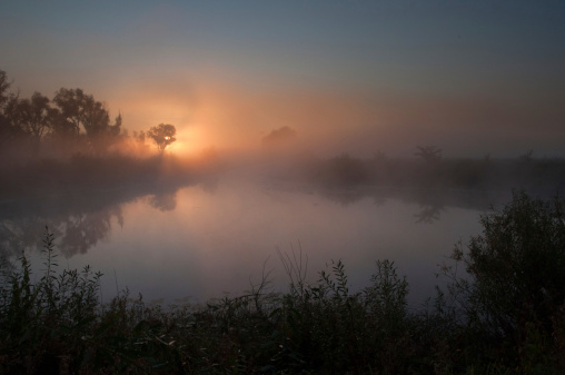 Foggy dawn over the river