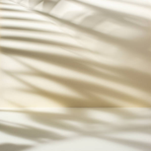 istock Light yellow abstract background with palm leaves shadow 1477863648