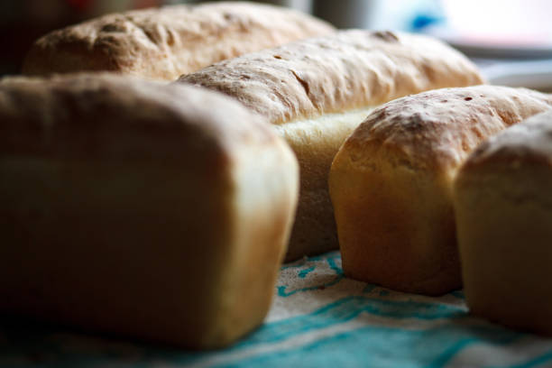istock Freshly baked homemade bread is on the table. 1477864019