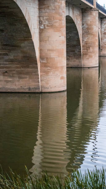 Reflections on the stone bridge of La Rioja.