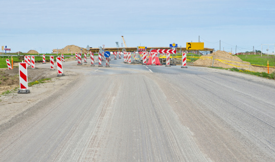 Roadsigns on road under construction.