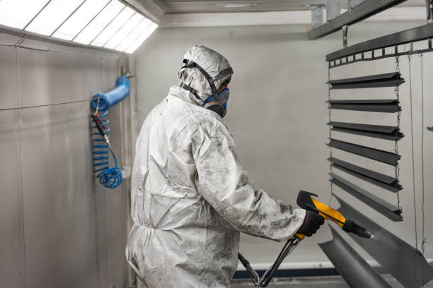 istock The craftsman paints structural elements in the painting box 1477871668