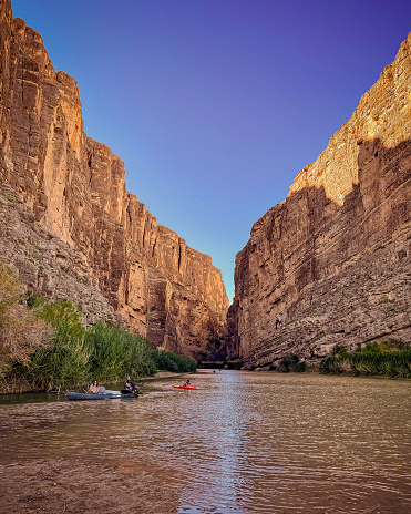Kayakers on the Rio Grande river running through Santa Elena Canyon in Texas’s Big Bend National Park.