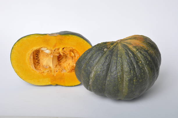 istock green pumpkin on a white background 1477875083