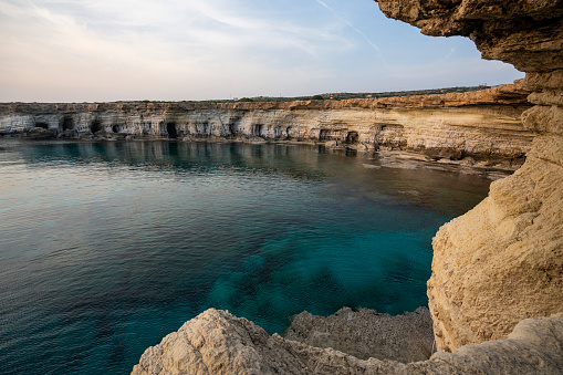 Sea caves in Cape Greco national park near Agia Napa and Protaras on Cyprus island, Mediterranean Sea