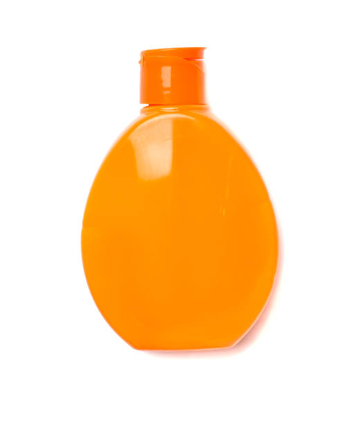 istock Bottle with sun protection cream isolated on white, top view 1477875606