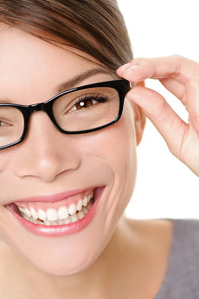 istock Glasses woman showing eyewear 147787595