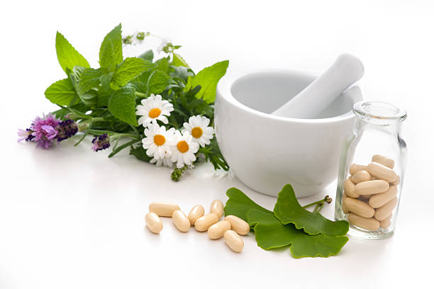 medicina alternativa - mortar and pestle lavender chamomile herb fotografías e imágenes de stock