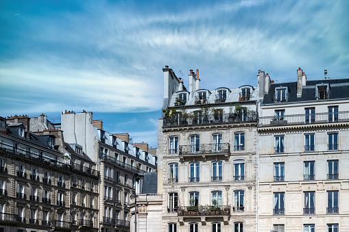 Paris, ancient buildings, typical parisian facadesrue de Rivoli with a lamppost