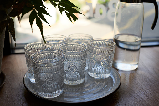 variety of empty glasses isolated on white