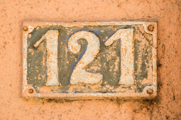 istock Old retro cast iron plate number 121 1477881405