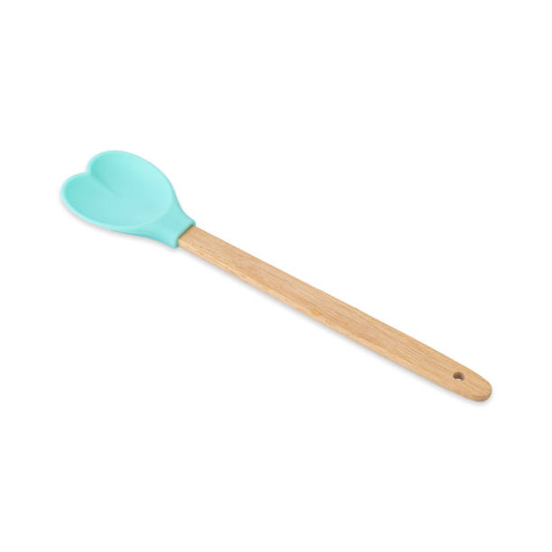 istock Heart shaped silicon and bamboo wooden spatula isolated over white background 1477882861