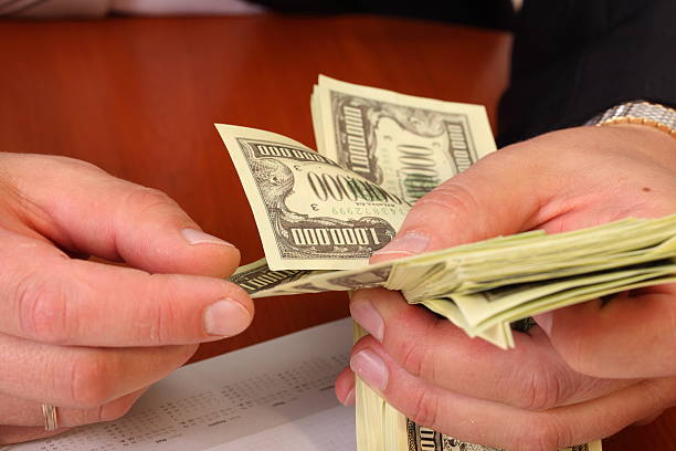 istock Men's hands, counted the money 147788558