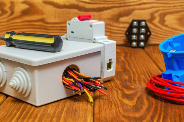 istock Electrical junction boxs with cables wire and tool used in the electric installation process 1477888131