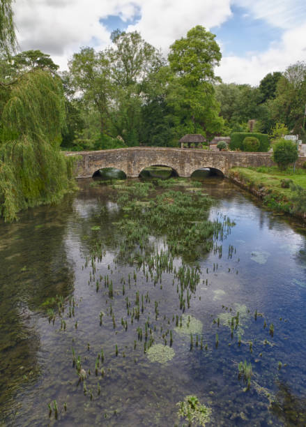 istock Bibury with River Coln, Cotswolds, Gloucestershire, UK 1477891851