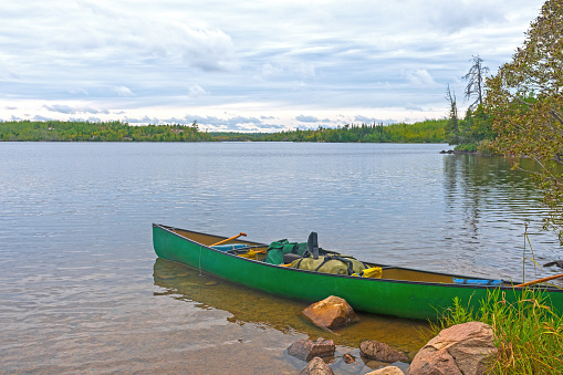 Canoe Ready on a Calm Lake on Alpine Lake in the Boundary Waters in Minnesota
