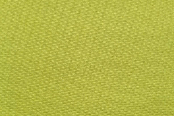 istock Green paper background saturated color. For decor or design. 1477893566