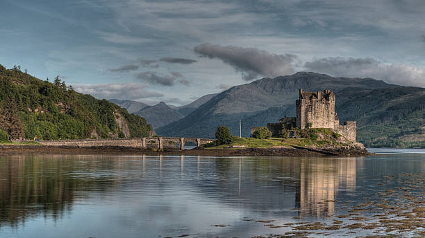 Eilean Donan Castle Famous Eilean Donan Castle in the scottish Highlands. Best Known by the Highlander Movie and James Bond scottish highlands castle stock pictures, royalty-free photos & images